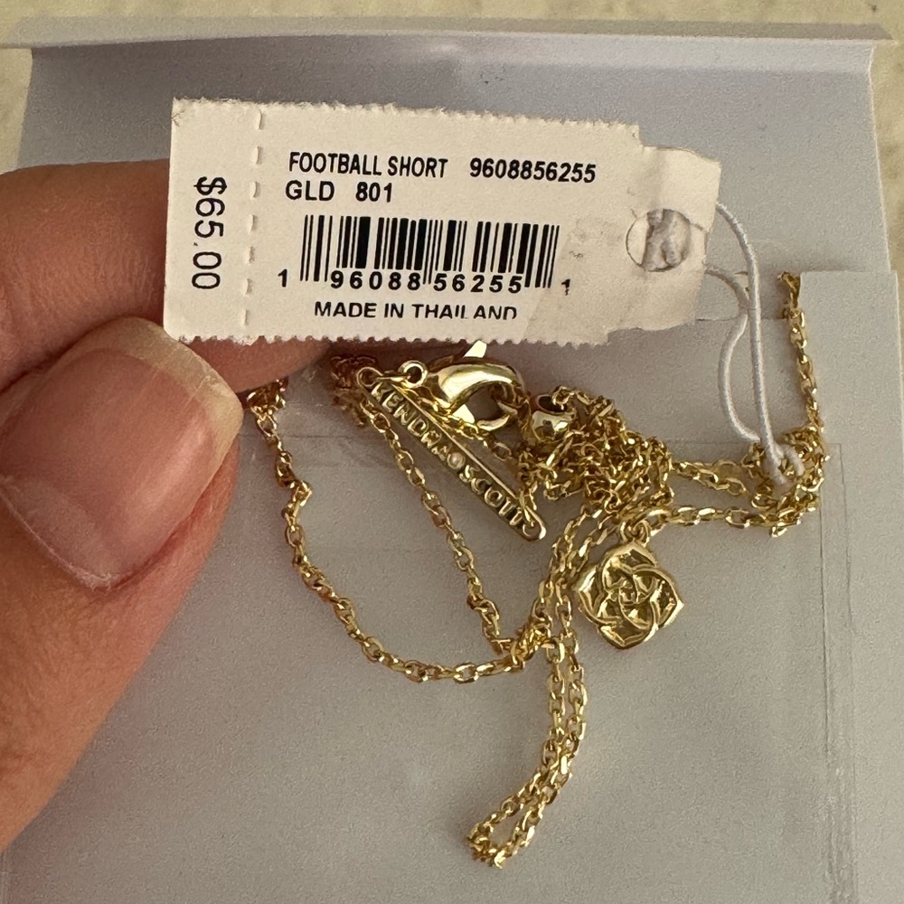 Kendra Scott 14k Plated Gold and Orange Sandstone Football Pendant Necklace - Picture 8 of 13